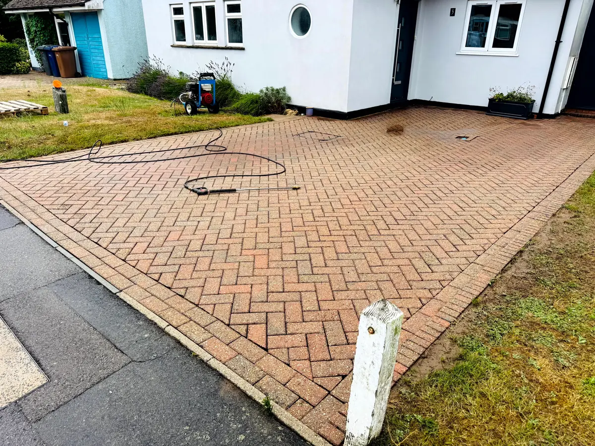 Clean driveway in Godalming, Surrey after pressure washing